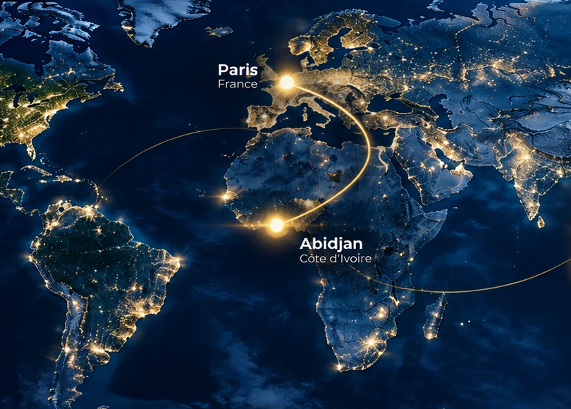Carte du monde de nuit : un arc doré relie Paris et Abidjan